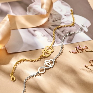 1 gouden armband met twee hartjes