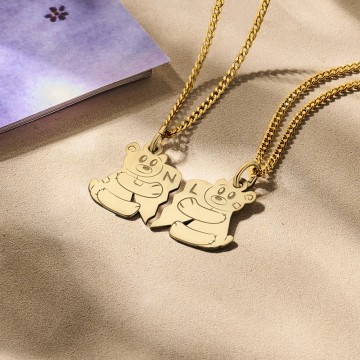 1 gouden breekhanger met beertjes