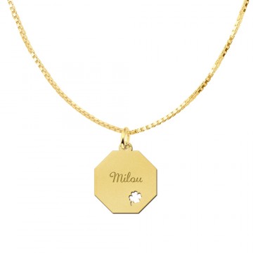 1 gouden graveerplaat met een klavertje