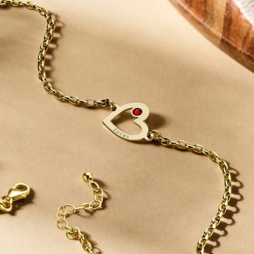 1 gouden hartjes armband met steentje