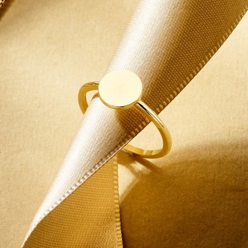 1 gouden zegelring disc met vingerafdruk