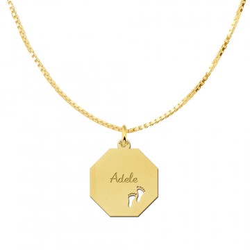 1 graveerplaat van goud met twee voetjes