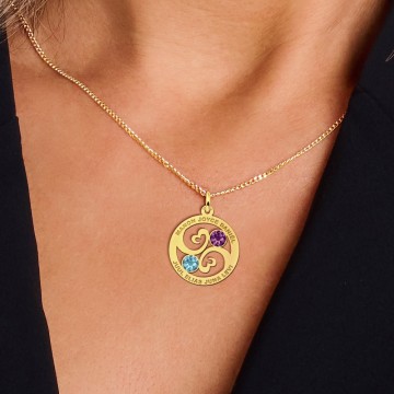 2 familie hanger met steentjes van goud