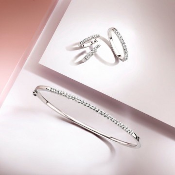 Oorringen witgoud briljant 0 48 crt 18200 nl g