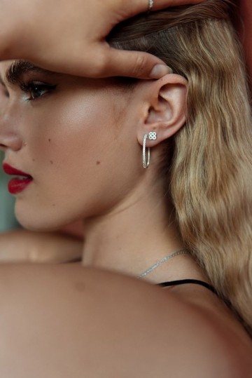 Oorringen witgoud briljant 0 48 crt 23815 nl g